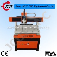 China cheap JCUT-5060B mini CNC advertisement engraving and cutting machine for sale